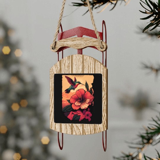 Hummingbird flies over hibiscus flower Tropical Sled Ornaments