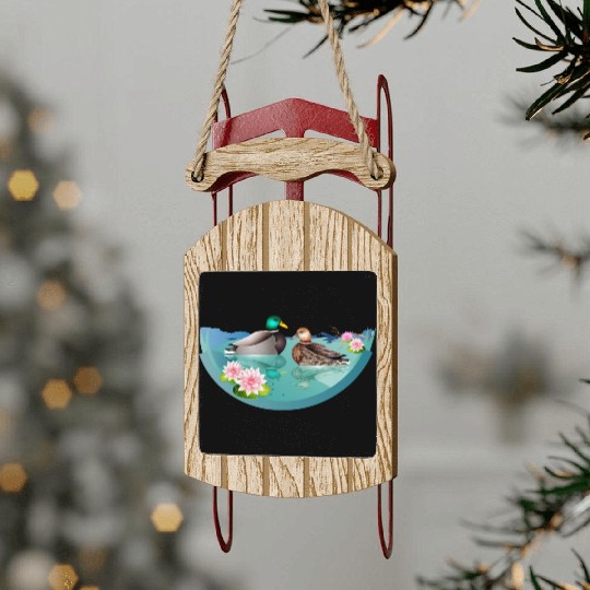 Duck couple in a duck pond with water lilies Sled Ornaments