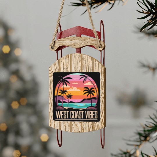Tranquil beach at sunset West Coast Vibes Sled Ornaments