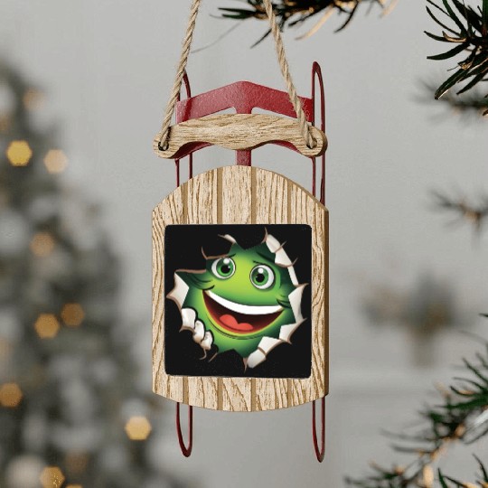 Cute Happy Green Monster Peeking Out Of a Hole Sled Ornaments