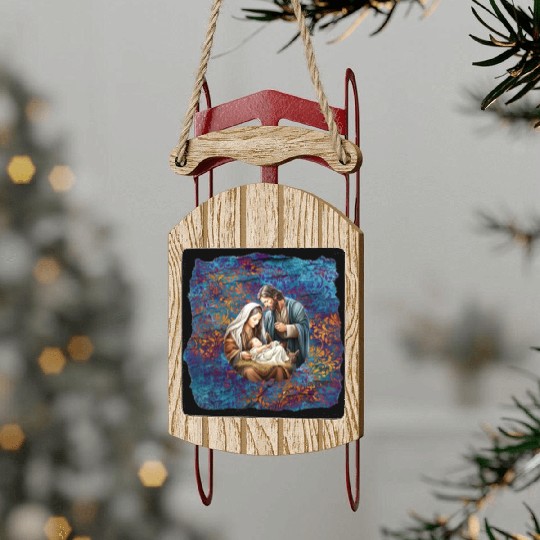 Nativity scene with Mary Joseph Baby Jesus Sled Ornaments