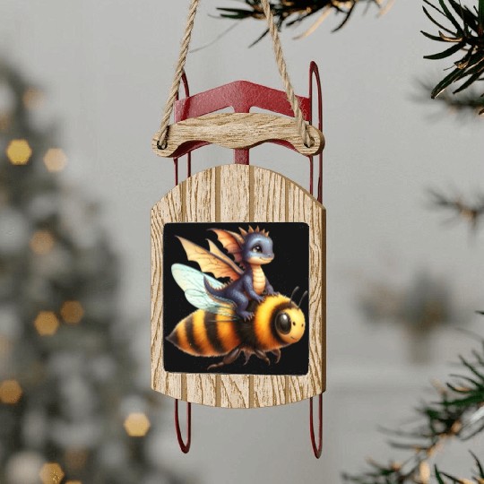 Fun Baby Dragon Riding a Bumble Bee Sled Ornaments