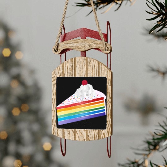 Piece of rainbow cake with cream and cherry Sled Ornaments