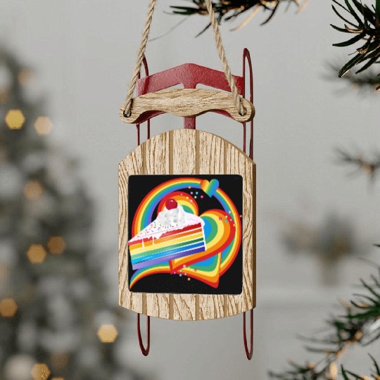 Piece of rainbow cake with cream and cherry Sled Ornaments