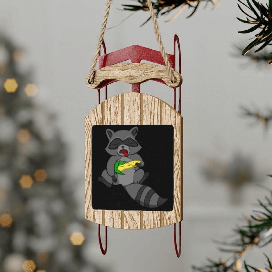 Sleeping Raccoon Sled Ornaments