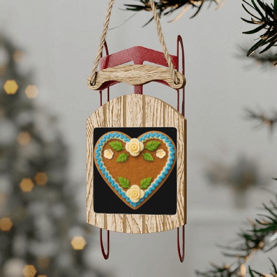 Heart-Shaped Gingerbread Cookie with Floral Icing Sled Ornaments