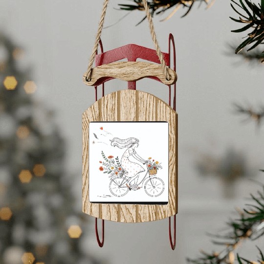 Girl Riding Bicycle with Flowers Vintage  Sled Ornaments