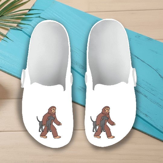Bigfoot Sasquatch Carrying Great Dane Slip On Clogs