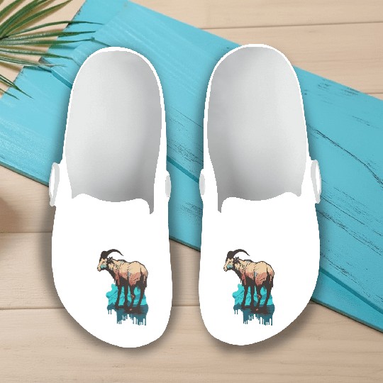 a mountain goat lives in the mountains Slip On Clogs