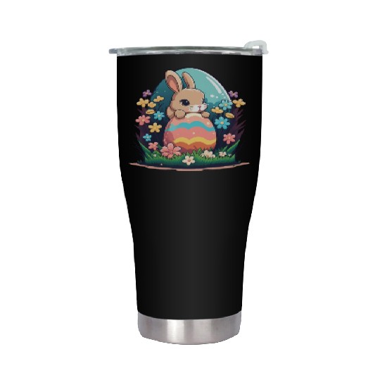 Easter magic: cheerful bunny next to colorful eggs Stainless Steel Tumblers