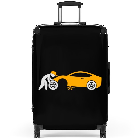 A Mechanic Repairing A Car Suitcases