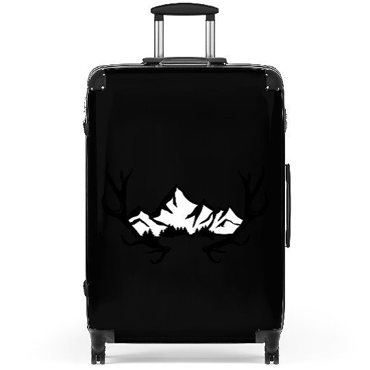 Deer antlers, snowy mountains and forest Suitcases