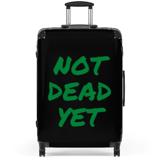 NOT DEAD YET (in green graffiti letters) Suitcases
