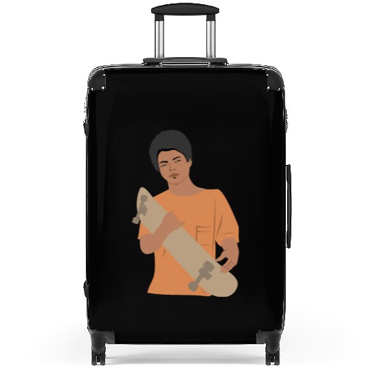 Young boy with skateboard Suitcases