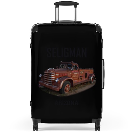 Old car city of Seligman in Arizonna, US Route 66 Suitcases