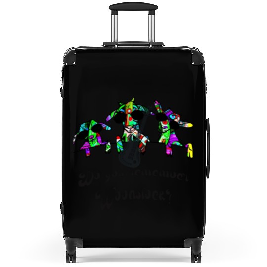 Hippie Goats playing guitar remembering Woodstock Suitcases