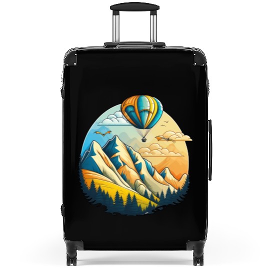 Hot air balloon over the mountains Suitcases