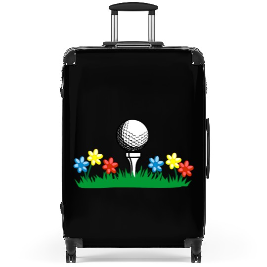Golf ball on grass field with flowers Suitcases