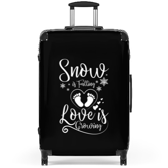 Becoming Mom & Dad Snow is falling love is growing Suitcases