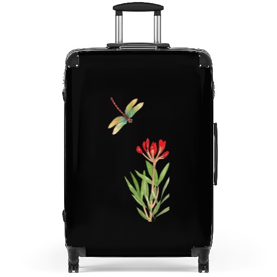 dragonfly flying over a plant Suitcases