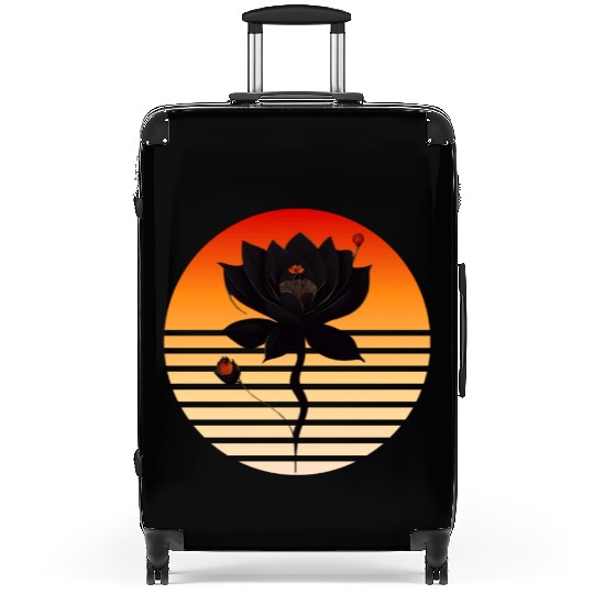 Black rose with sunset colors Suitcases