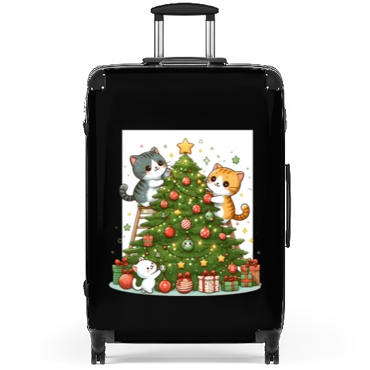Kittens decorate a Christmas tree Suitcases