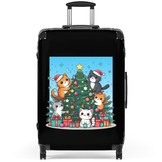 Kittens decorate a Christmas tree Suitcases