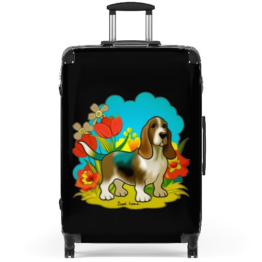 A sweet basset hound dog Suitcases