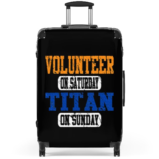 Volunteer and Titan Fun Suitcases