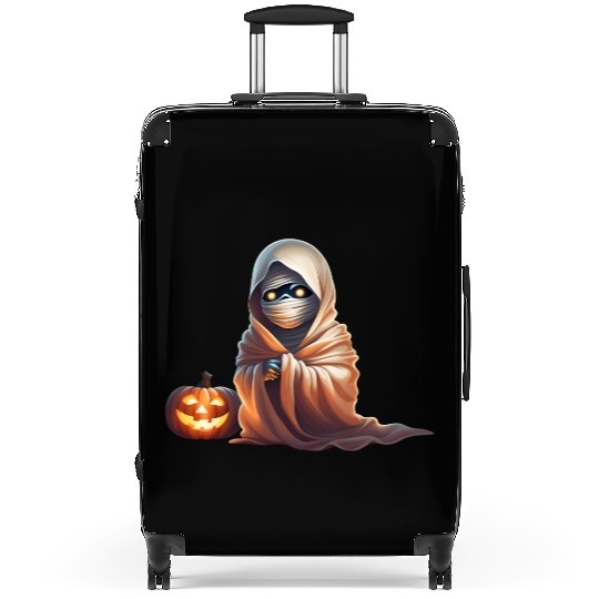 Little Mummy Sitting with Pumpkin Suitcases