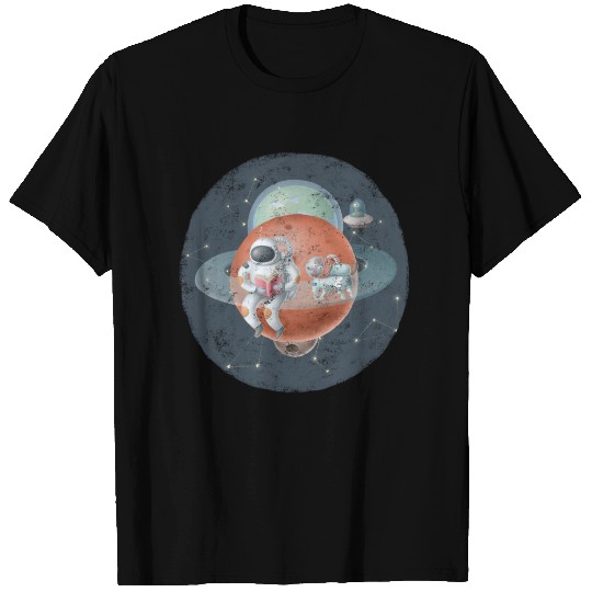 Astronauts reading book on saturns ring T Shirts