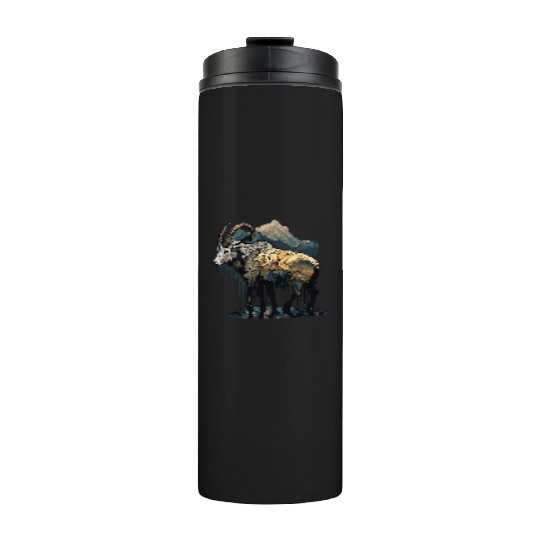 a mountain goat lives in the mountains Thermal Tumblers