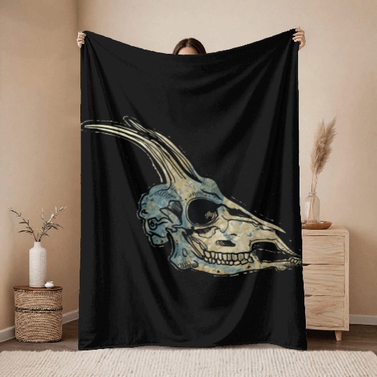 Capricorn skull Throw Blankets