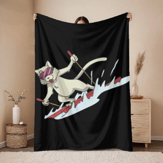 Cat on skis skiing Throw Blankets