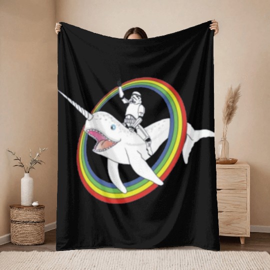 Spaceman riding narwhal through rainbow Throw Blankets