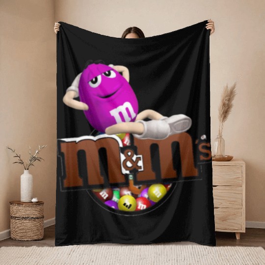 Funny M&m’s man relaxing on her self Throw Blankets