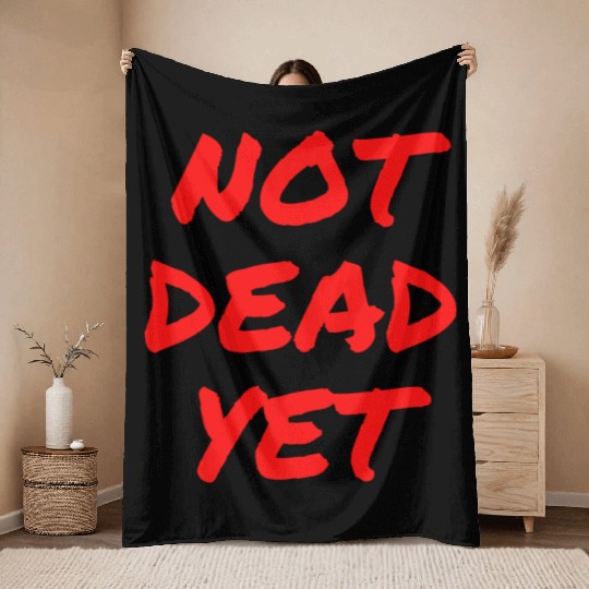 NOT DEAD YET (in graffiti red letters) Throw Blankets