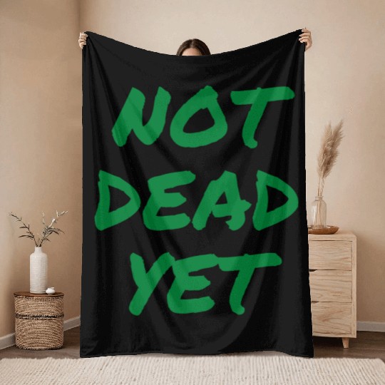 NOT DEAD YET (in green graffiti letters) Throw Blankets