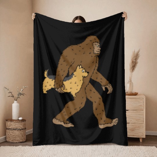 Bigfoot Sasquatch Carrying Yorkshire Terrier Throw Blankets