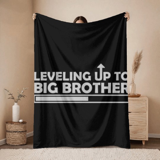 Leveling up big brother Throw Blankets