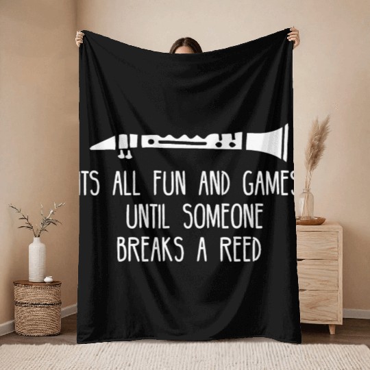 its all fun and games until someone breaks a reed Throw Blankets