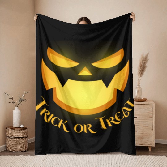 pumpkin horror face Throw Blankets