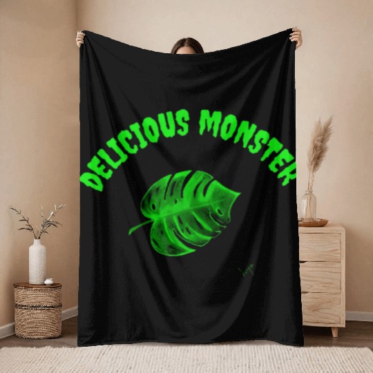 Green delicious monster Throw Blankets