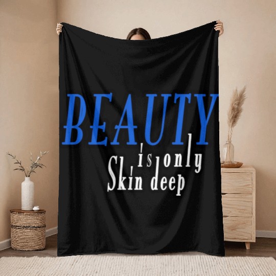 beauty is only skin deep Throw Blankets