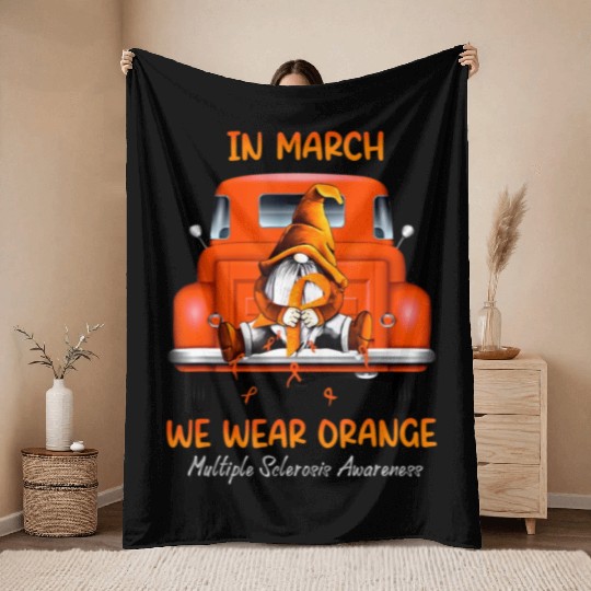 Gnome Sitting On Truck In March We Wear Orange T Throw Blankets