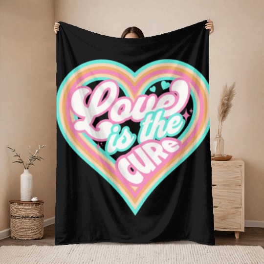 LOVE IS THE CURE (pink) Throw Blankets