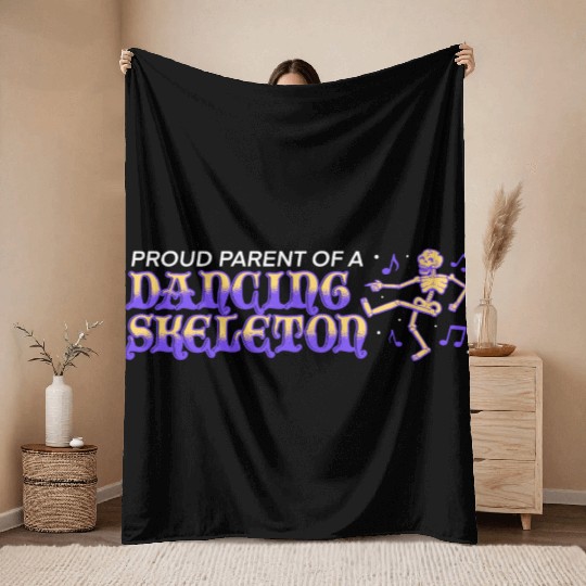 proud parent of a dancing skeleton Throw Blankets