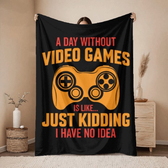 A day without video games is like just kidding Throw Blankets