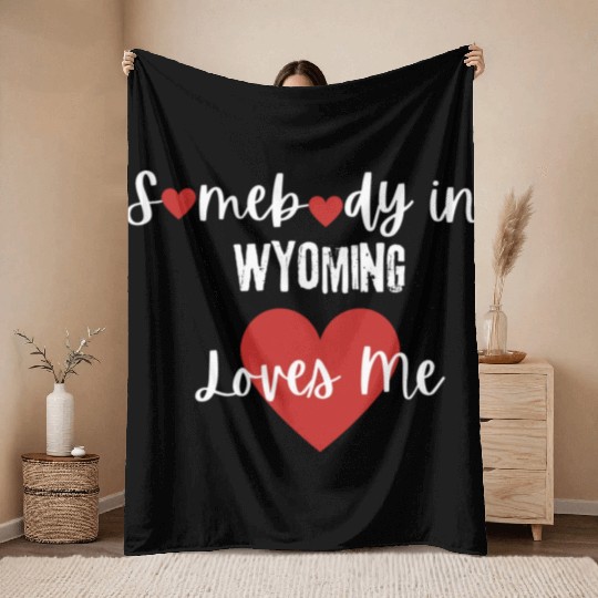 Somebody in Wyoming Loves Me Throw Blankets