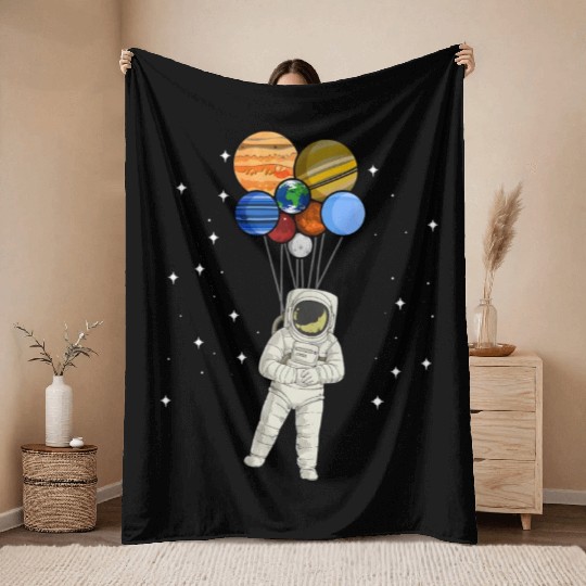 Astronaut Holding Planet Balloons of Solar System Throw Blankets